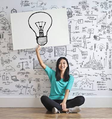 woman-draw-a-light-bulb-in-white-board-3758105.jpg